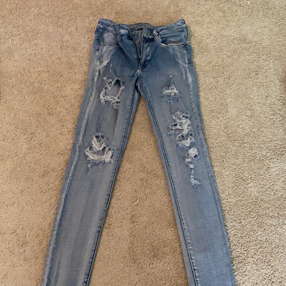 Heavily ripped jeans